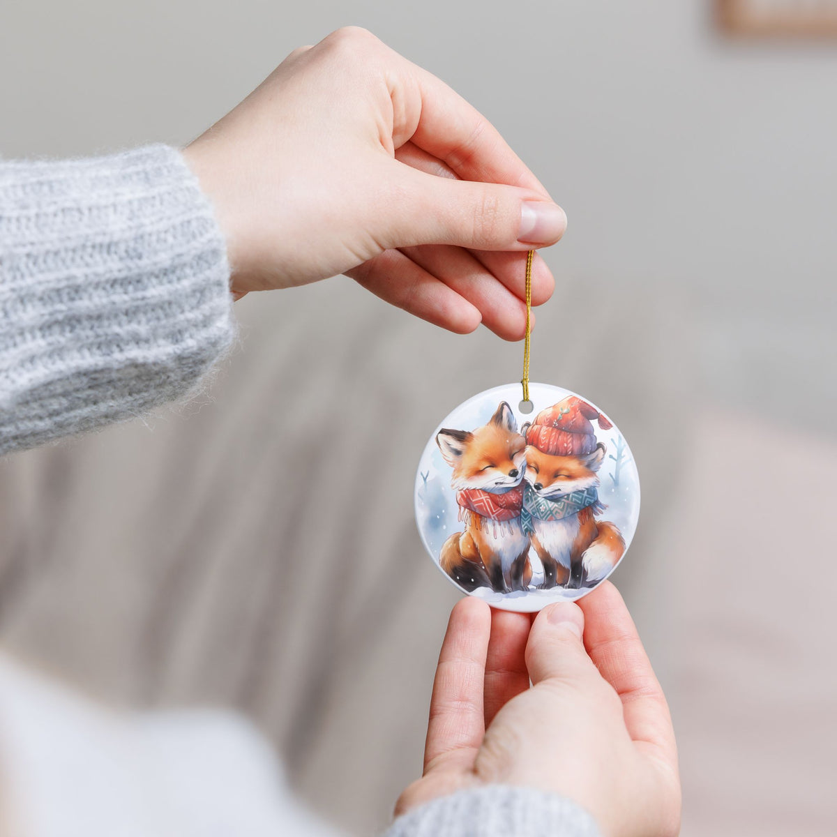 Ceramic Christmas Ornament with Cozy Winter Foxes Item #59213