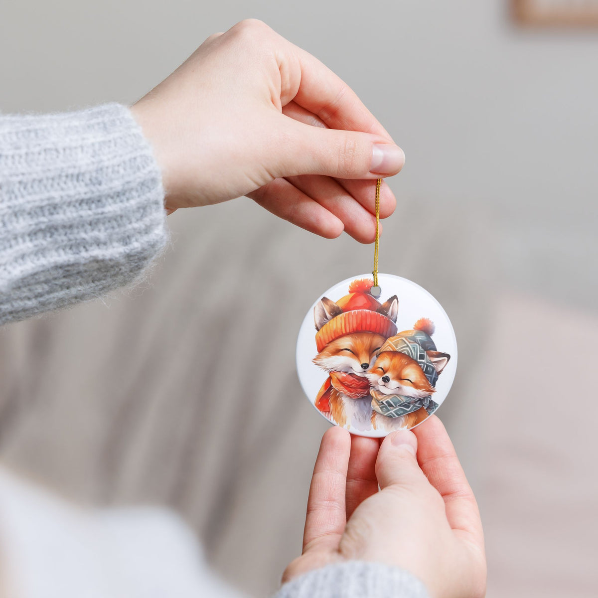 Ceramic Ornament with Cozy Winter Foxes   Item #52451
