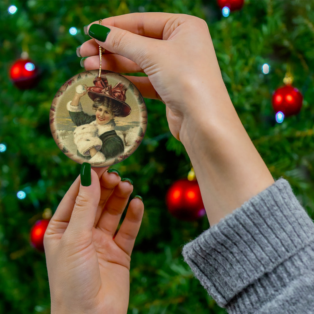Woman With Snowball Ceramic Disc Ornament        Item #488508 - Buckshot's Bargain Barn