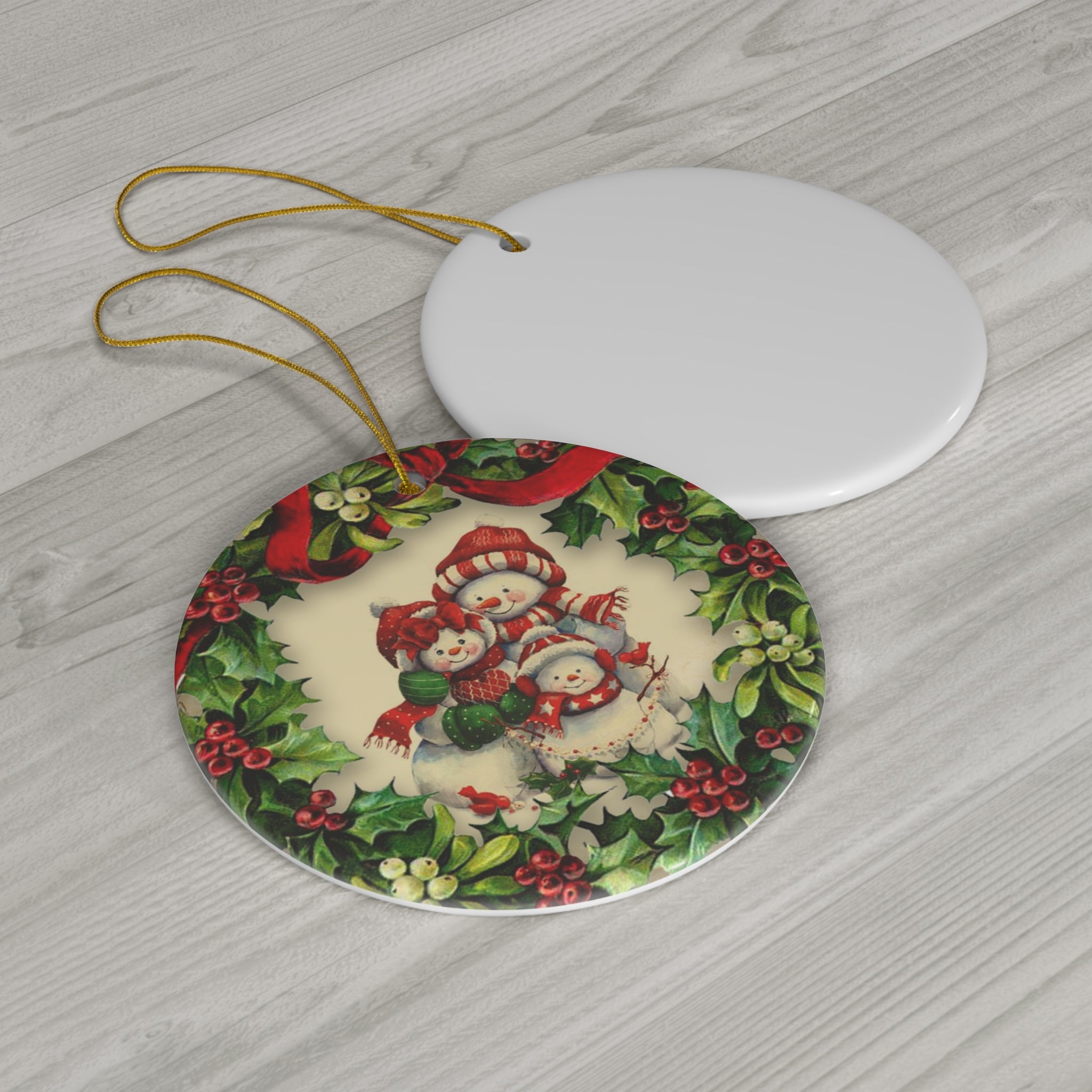 Wreath Snowmen Ceramic Disc Ornament        Item #9861743 - Buckshot's Bargain Barn