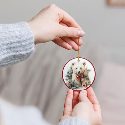 Ceramic Christmas Ornament – Polar Bear with Red Bow and Winter Greenery  Item #729052